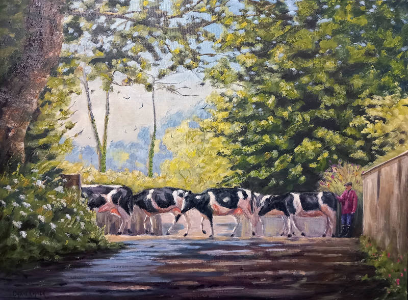 A oil painting of dairy cows being herded across a road to be milked by the farmer.